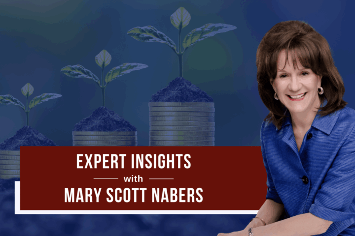 mary scott nabers smiles in front of a blue graphic with data storage